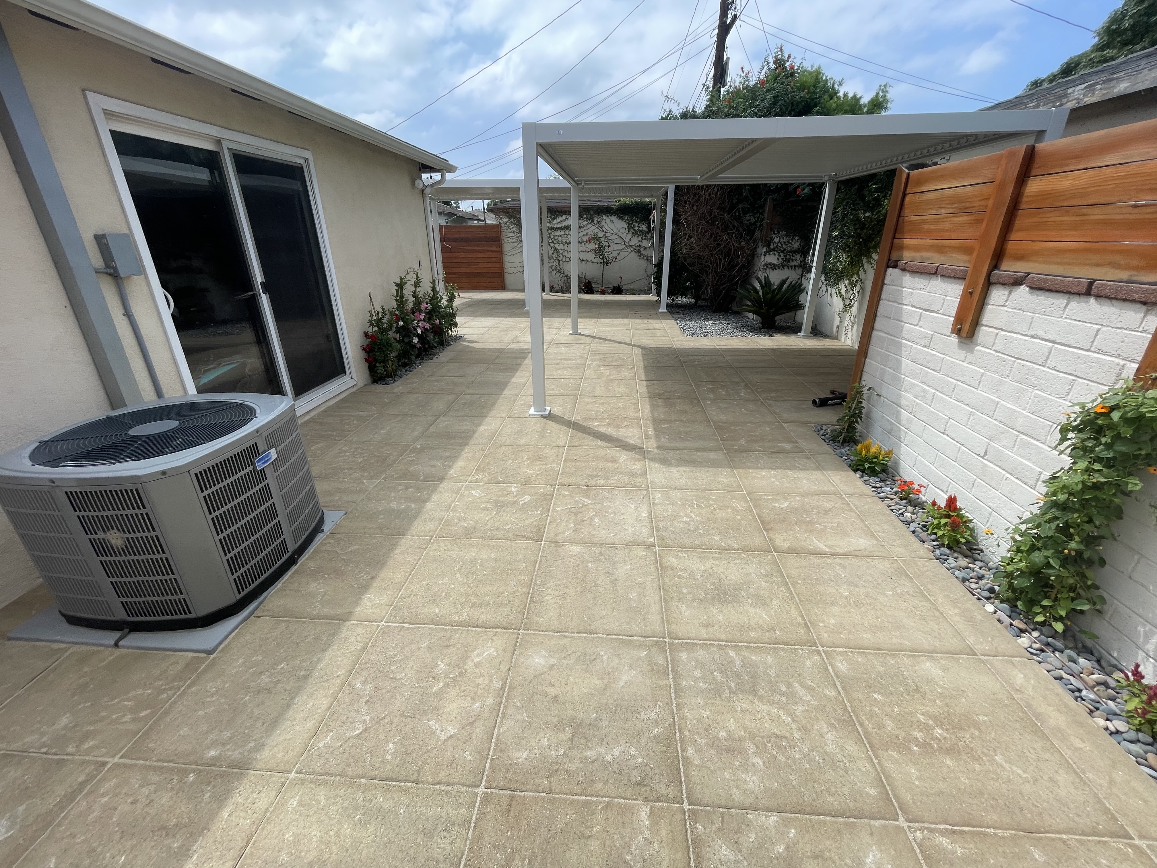 An outdoor patio that is completed by Green Design Builders